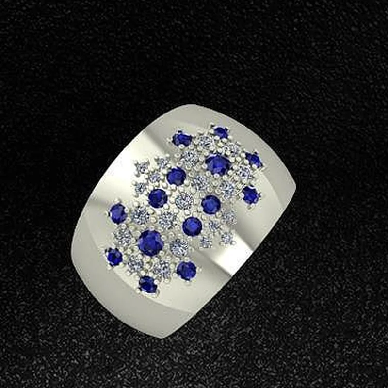 Diseño 3D de una sortija ancha de oro blanco con zafiros y diamantes